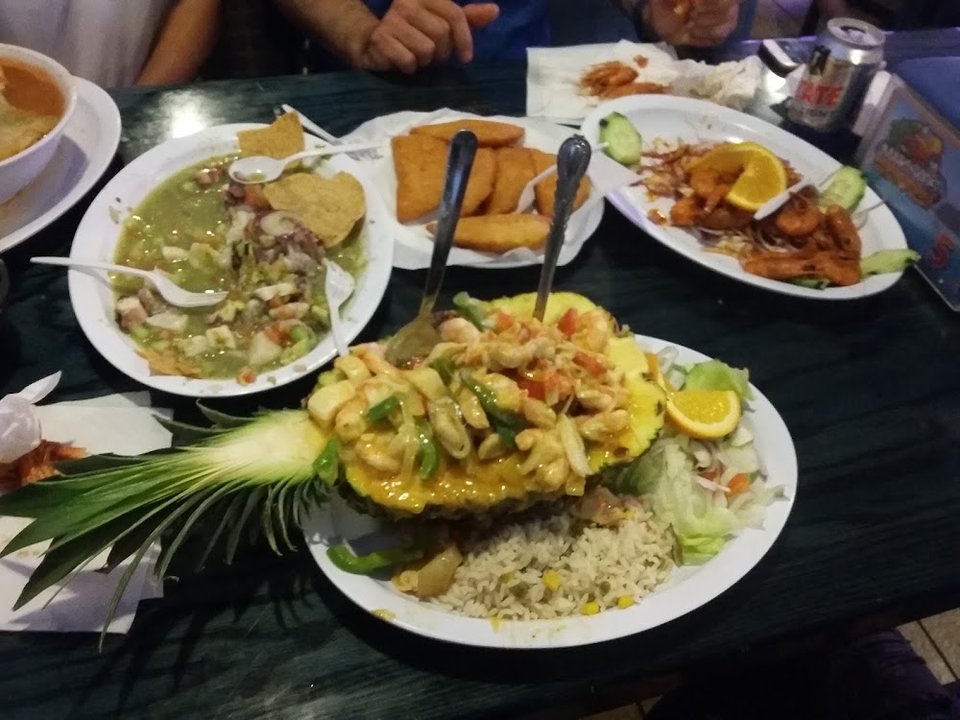 Menu page showing seafood plates and small bites.